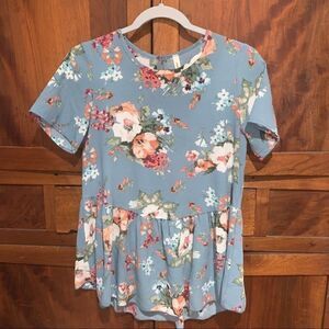 Orange Creek. Louse short sleeve ruffled edge size small polyester blend